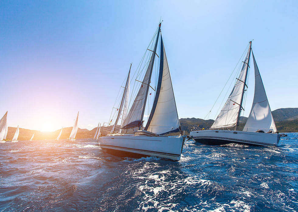 Sunset Sailboats