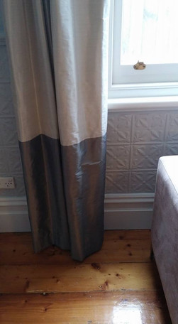Pencil Pleat Drapes on a black rod