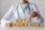 close-up-doctor-holding-wooden-cube.jpg