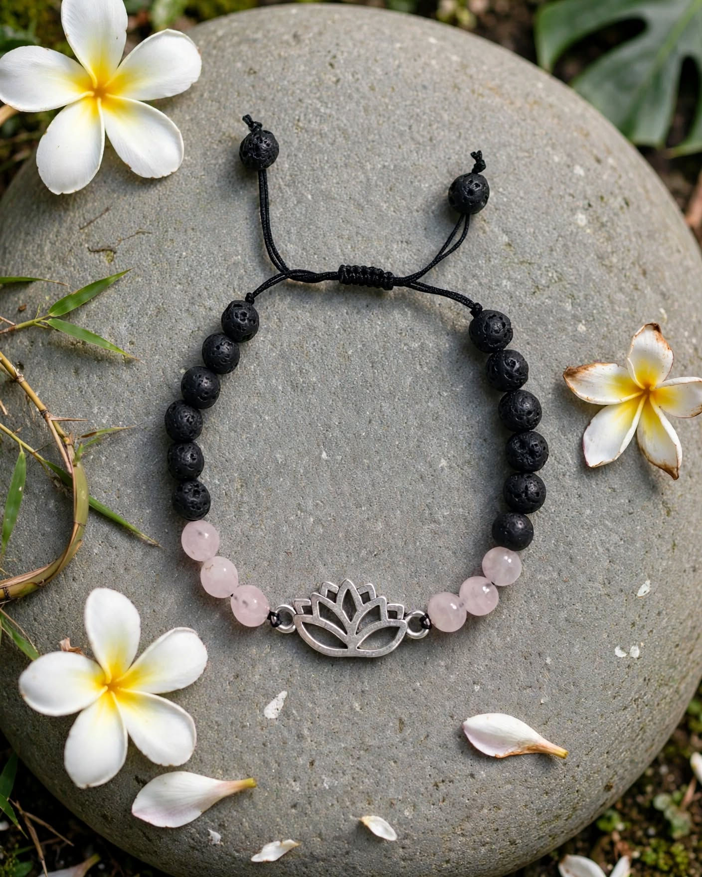 Lotus flower bracelet Rose Quartz silver lotus link black lava 6mm adjustable on grey river stone with frangipani flowers zen
