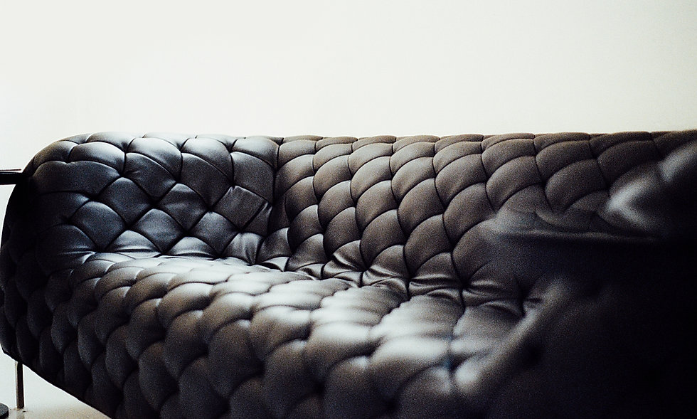 leather sofa tufted