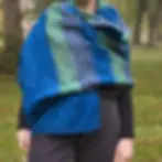 Elegant yak wool shawl worn as a wrap.