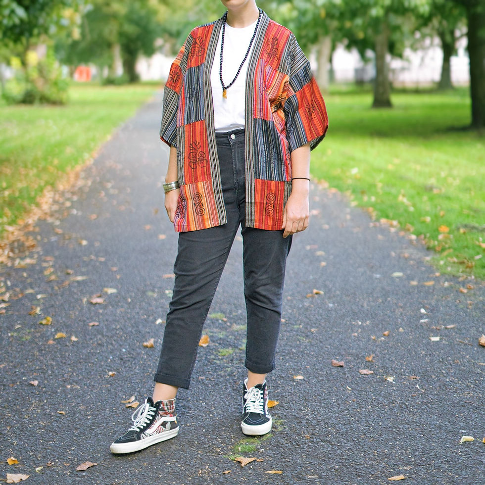 Cozy patchwork kimono, relaxed fit.