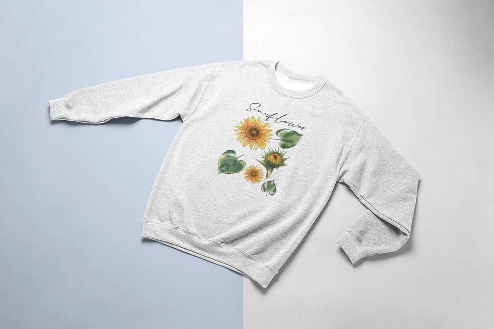 Thumbnail: Grey sweatshirt with sunflower design, laid flat on a blue and white surface.
