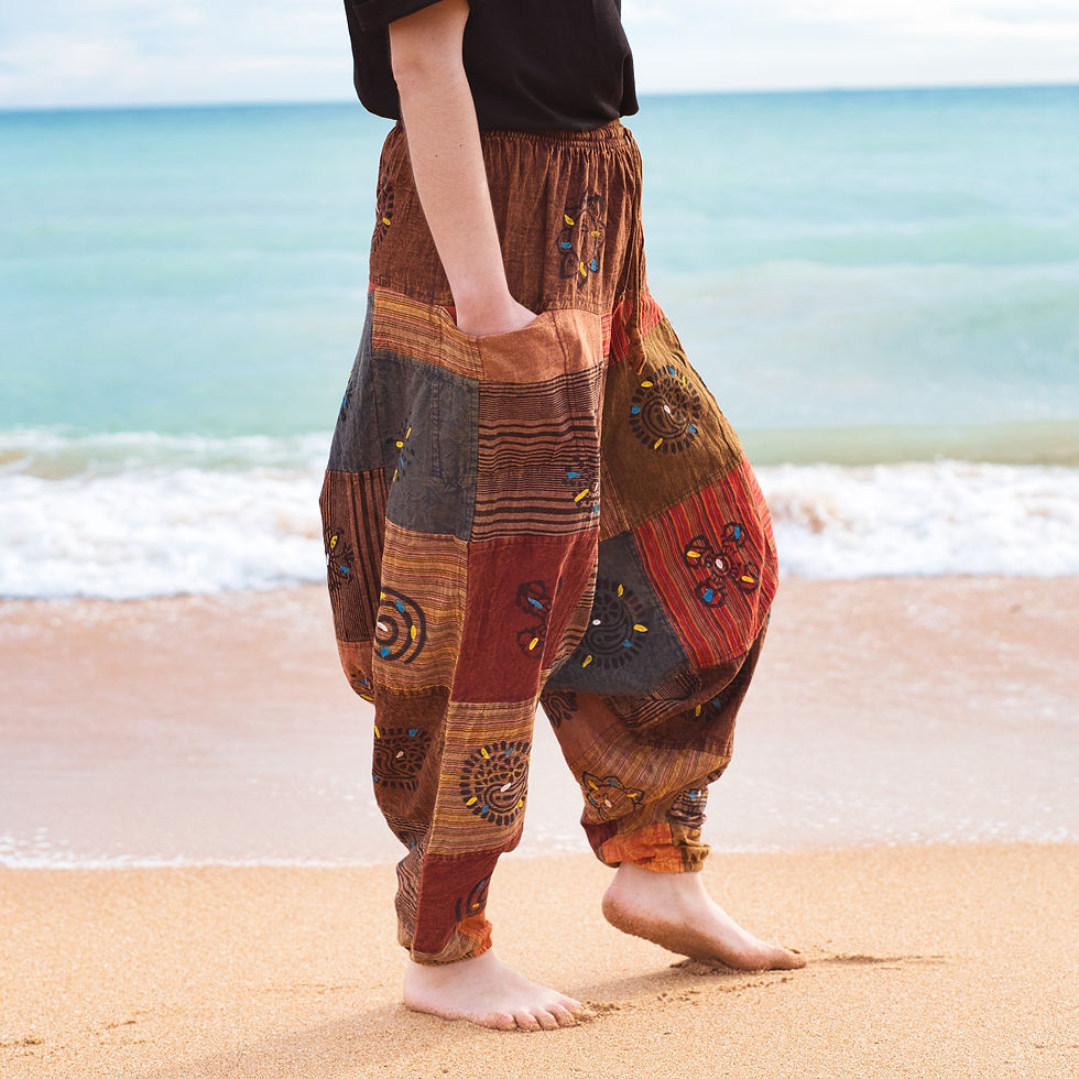 Flowing aladdin trousers, relaxed drape.