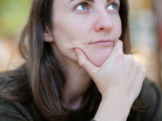 A woman thinking about what to do