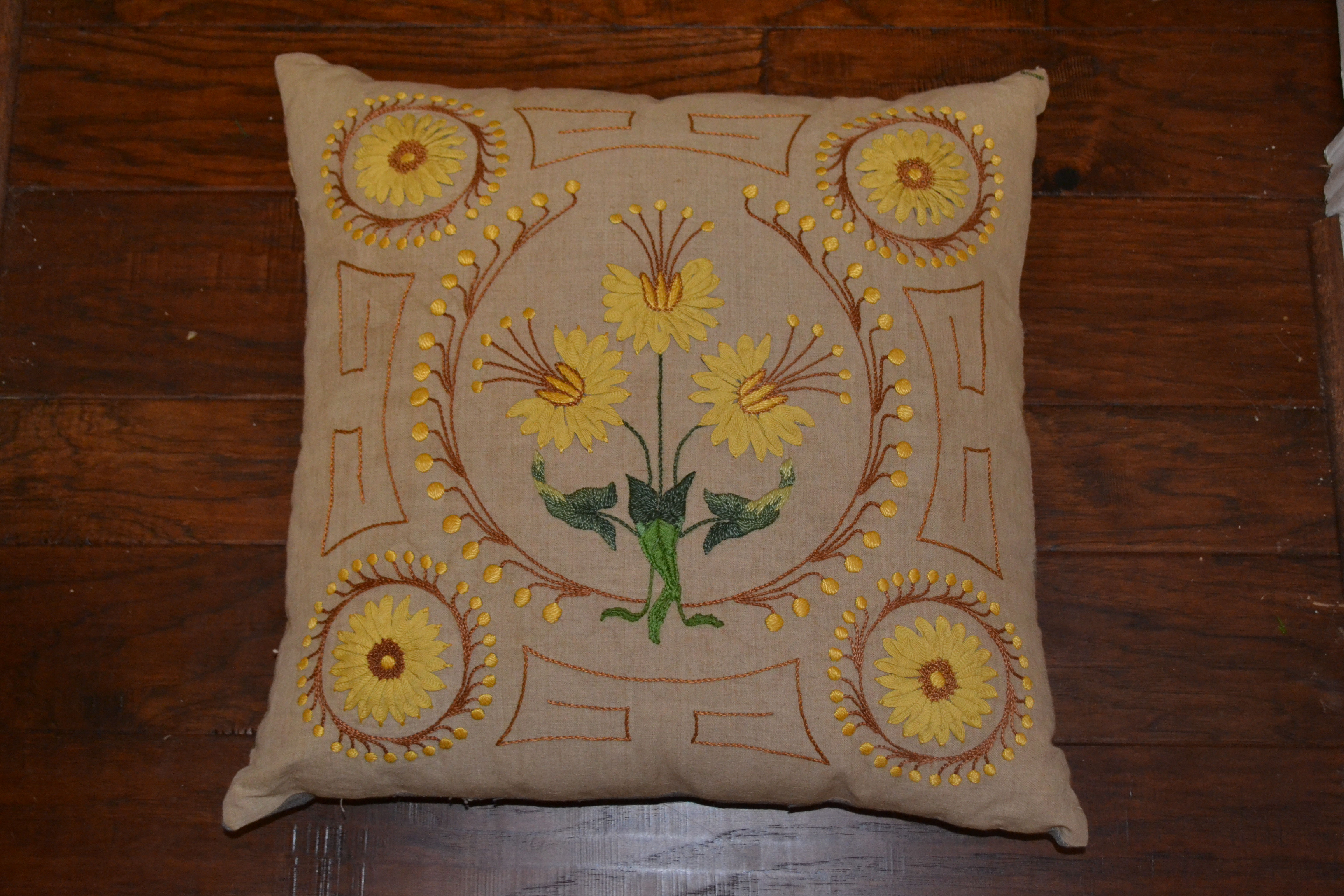 Decorative Arts and Crafts Pillow in shades of green, yellow & brown