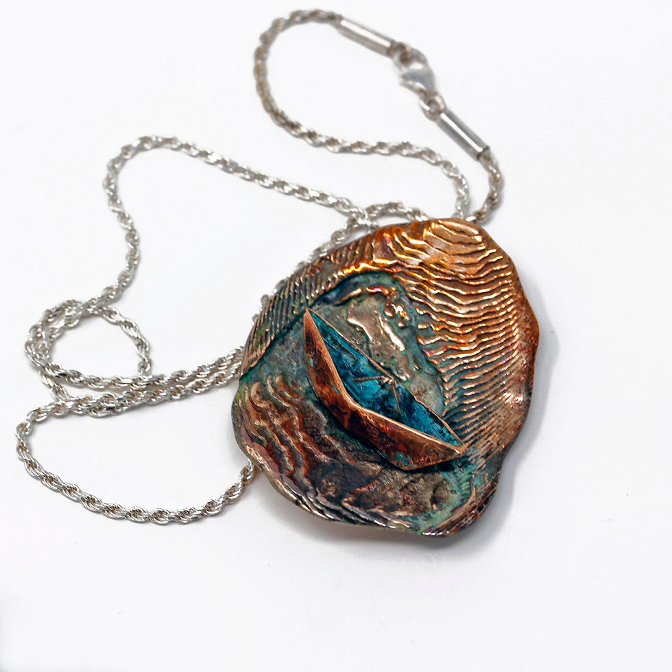 Pendente in argento e bronzo.  fusione in osso di seppia. Vendita online.