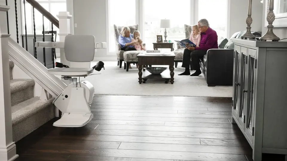 Bruno stair lift with family in background