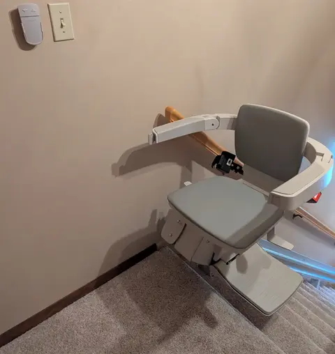 Bruno stair lift turned for dismount at top of stairs