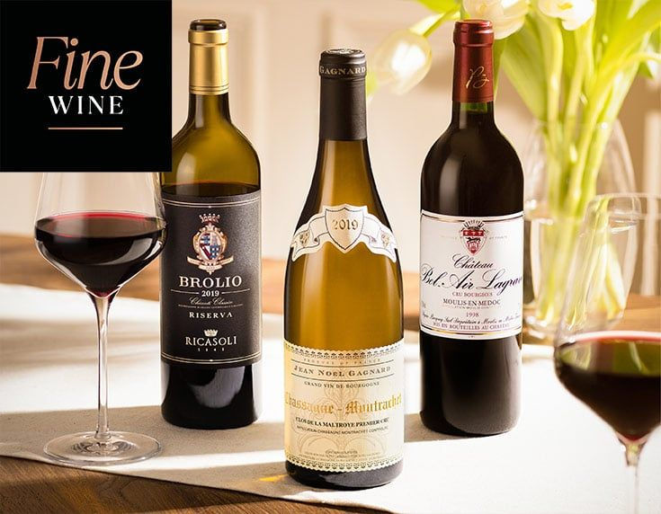 The two bottles on each end are Bordeaux while the middle one is Burgundy. Picture: The Wine Society