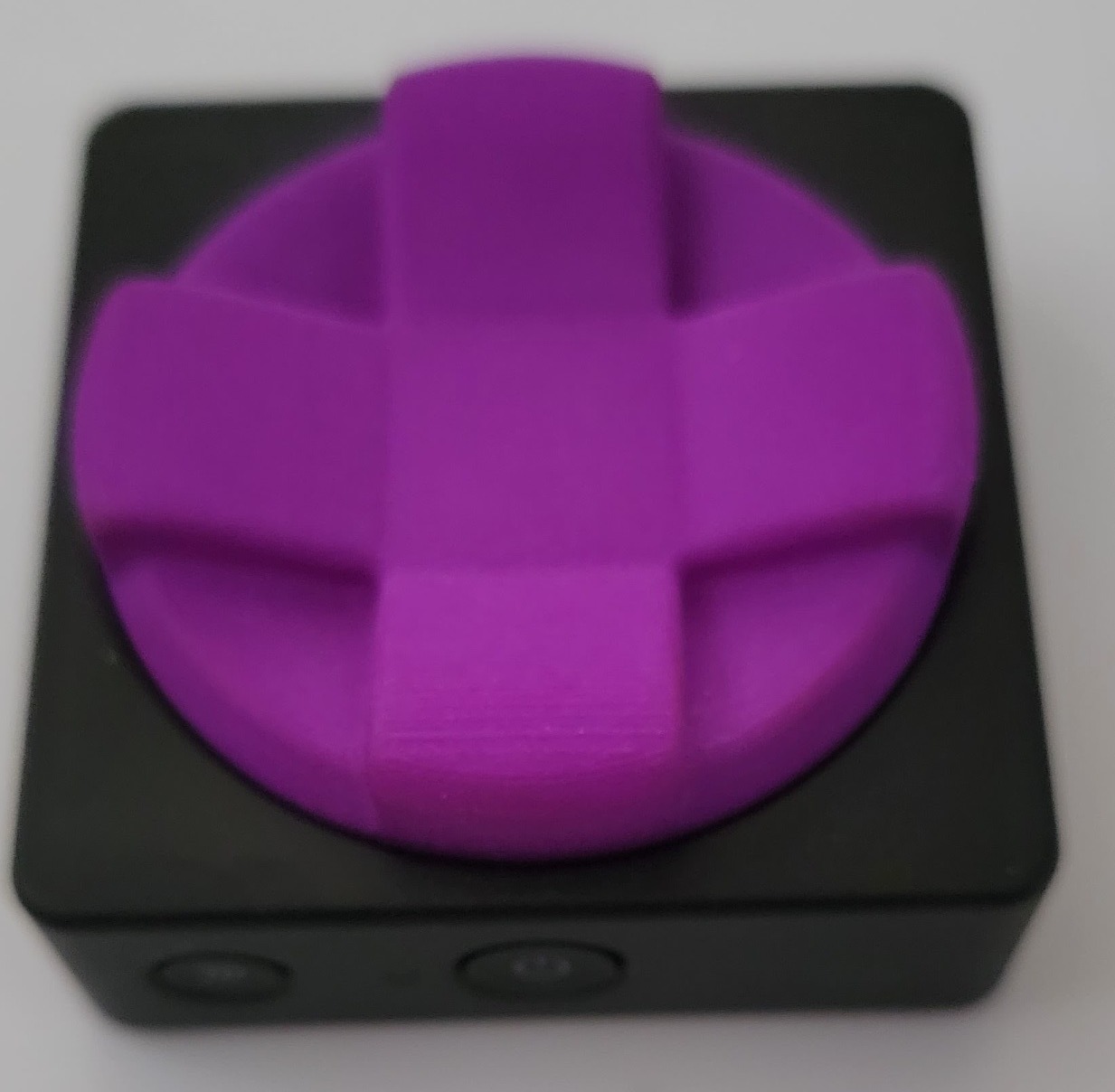 The button with the purple option