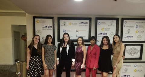 Act Now Foundation Interns group picture at the music & memories gala