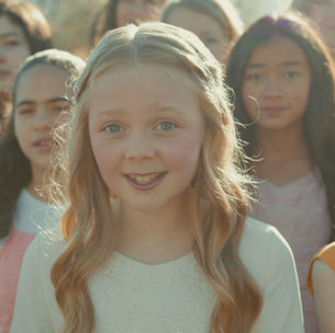 Young girls singing together