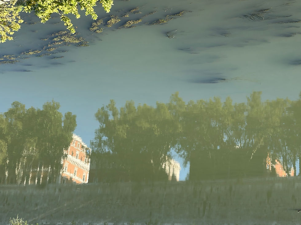 Reflection of Roman Houses in River Tiber.