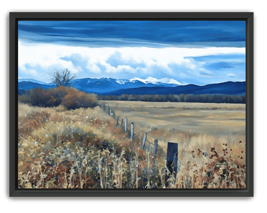 Golden field with wild grasses, a fence line, and distant blue mountains under a dramatic blue sky, set in a black frame