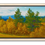 Thumbnail: Vibrant autumn landscape with golden trees, green hills, and distant blue mountains, set in a natural wood frame.