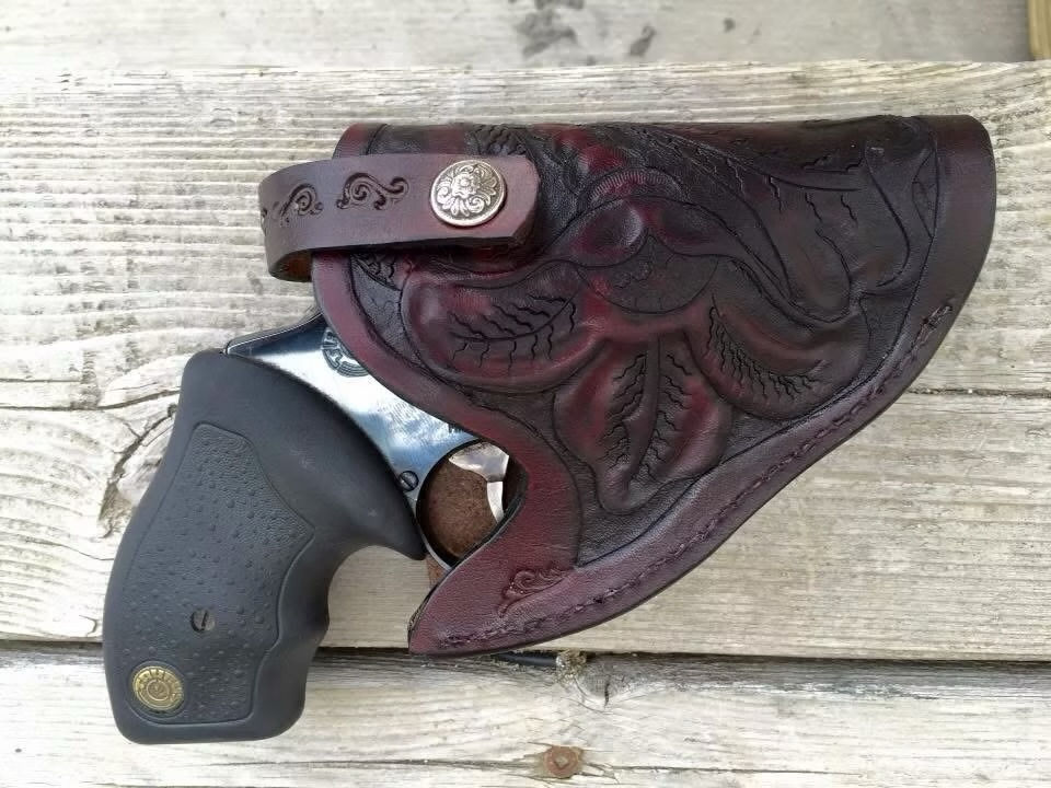The pistol in the holster