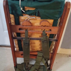 A freight hauling external frame pack.