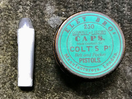 Nitrated paper cartridges for the Walker Colt revolver. 