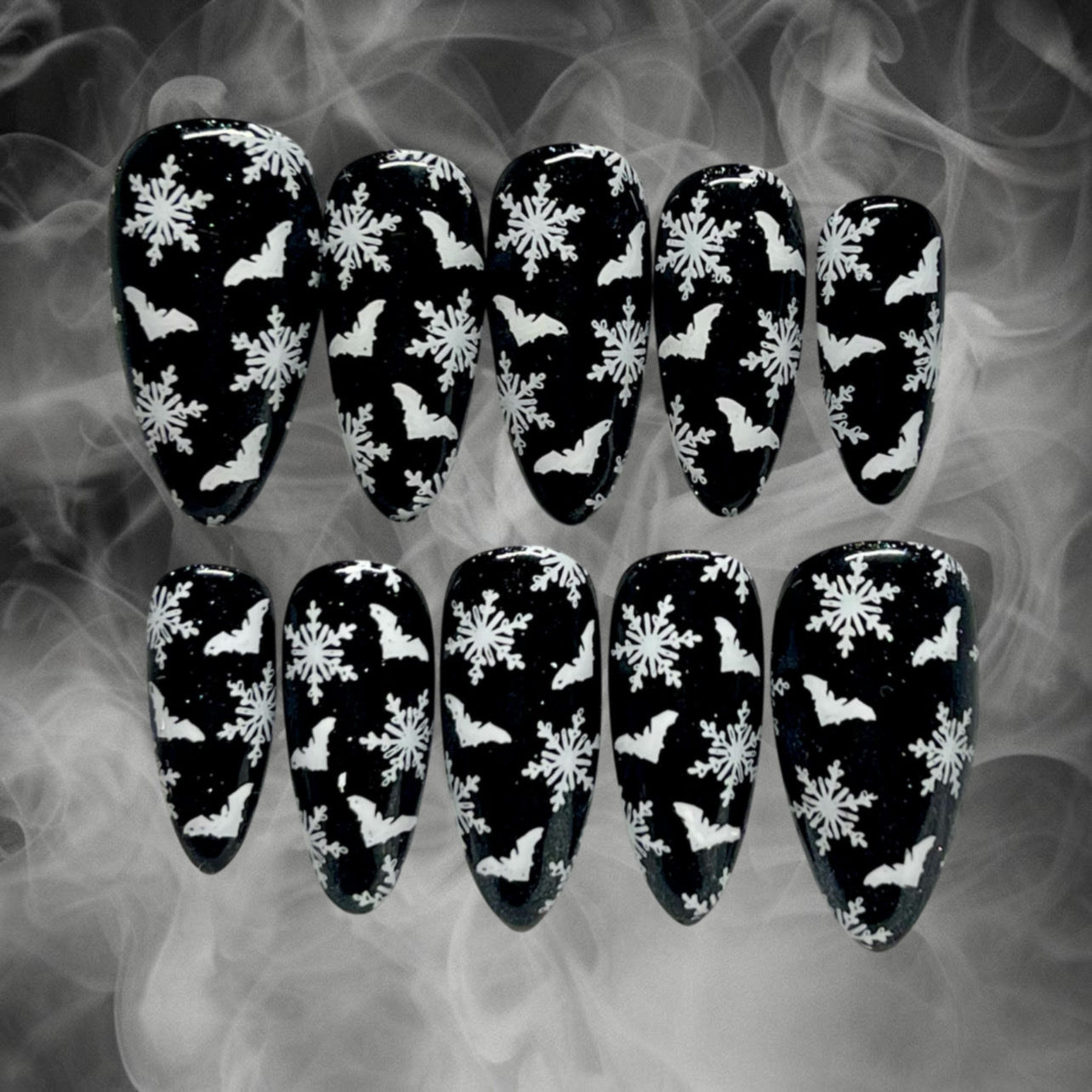 Bats flying through Snowflakes • Black