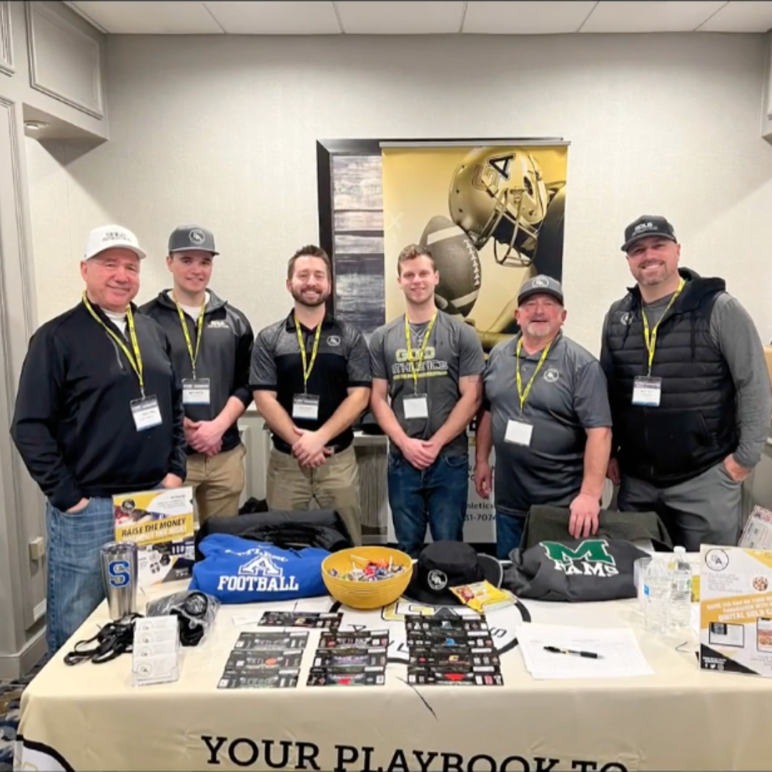 Fundraising Coaches at clinic booth setup. 2024.