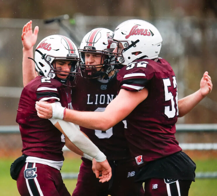 Chelmsford Football players celebrating in game