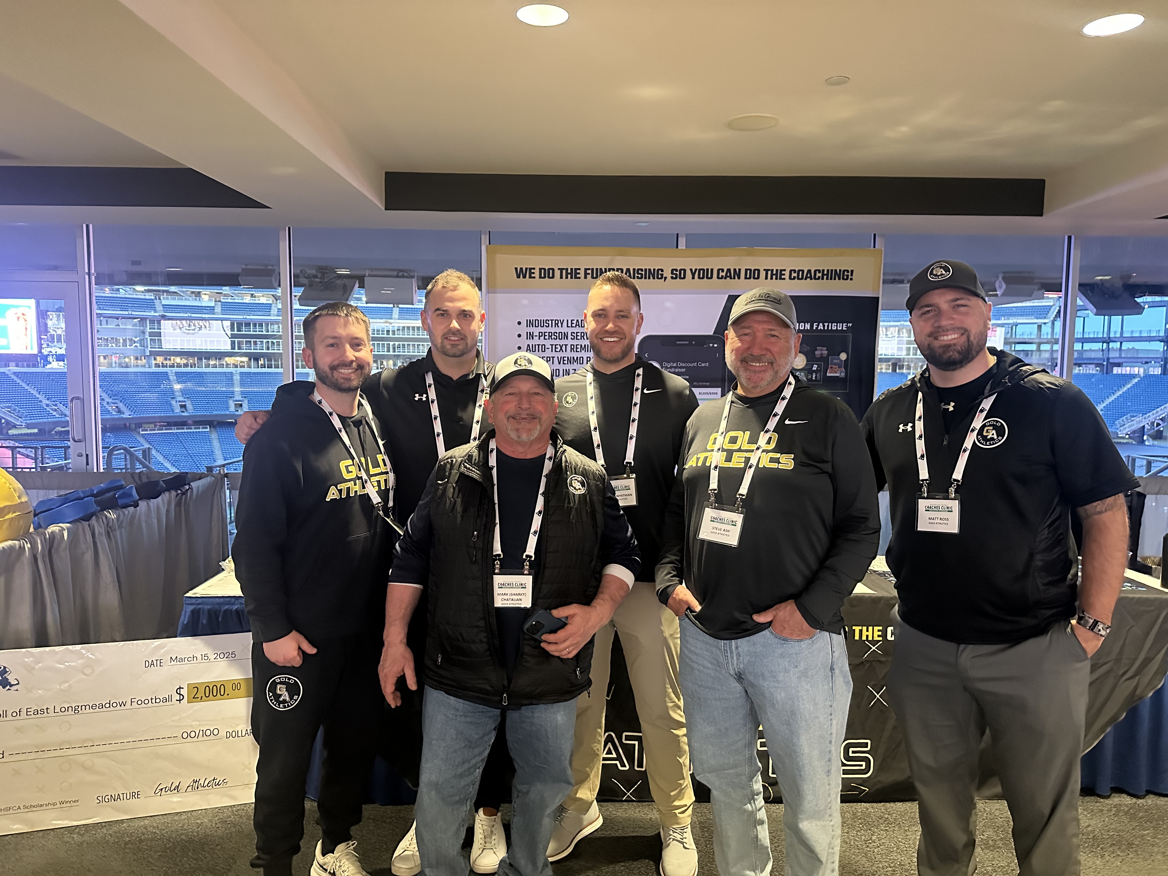 Gold Athletics' fundraising reps at the MHSFCA clinic at Gillette Stadium
