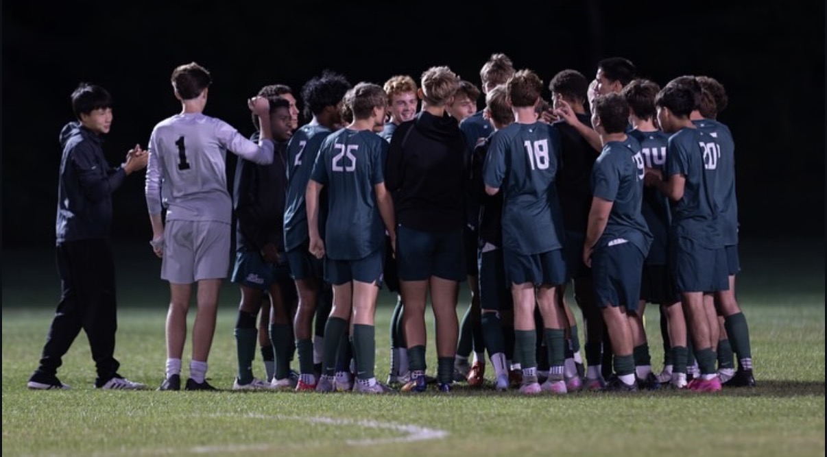 The Shen Boys Soccer team huddled during a game