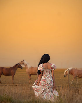 Woman with horses.jpeg