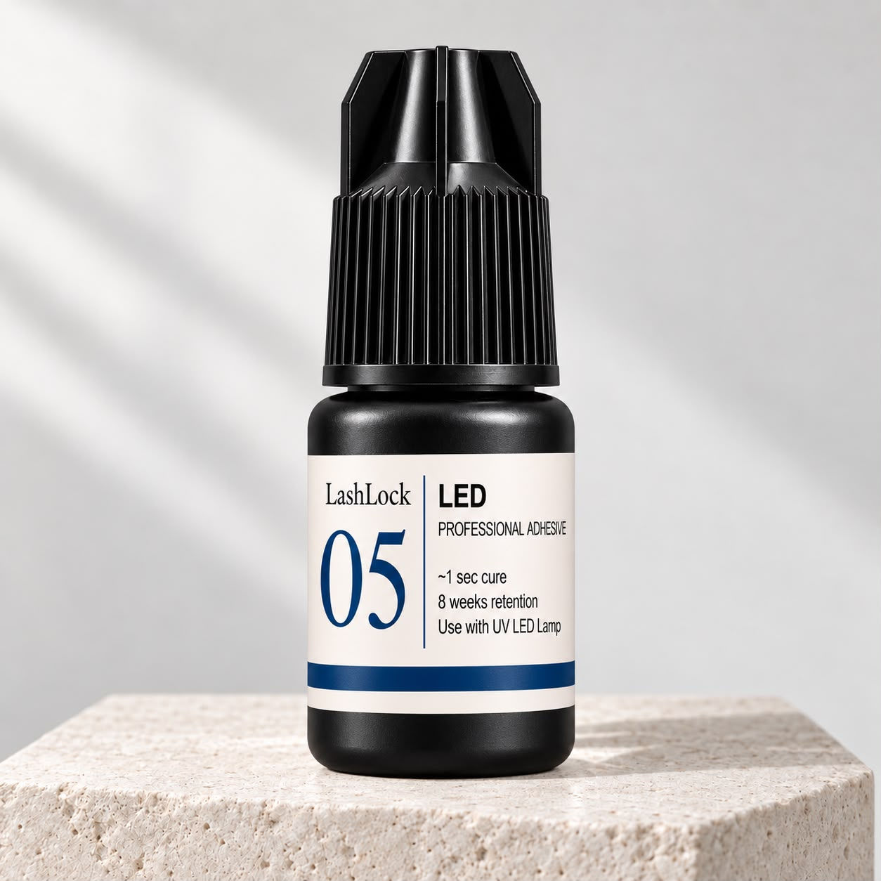 LashLock 05 LED professional lash extension adhesive bottle, 1-second curing with 405nm UV LED light.