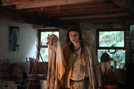 Kestrel holding puppet and storytelling