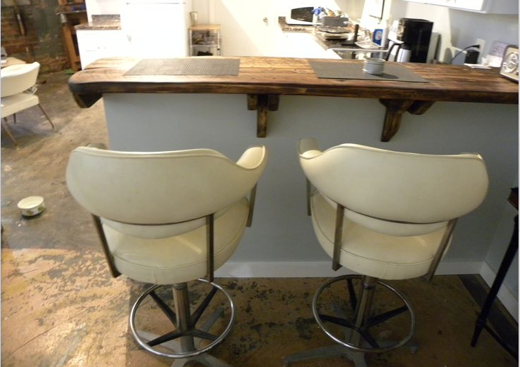 Item: Vinyl captains chairs