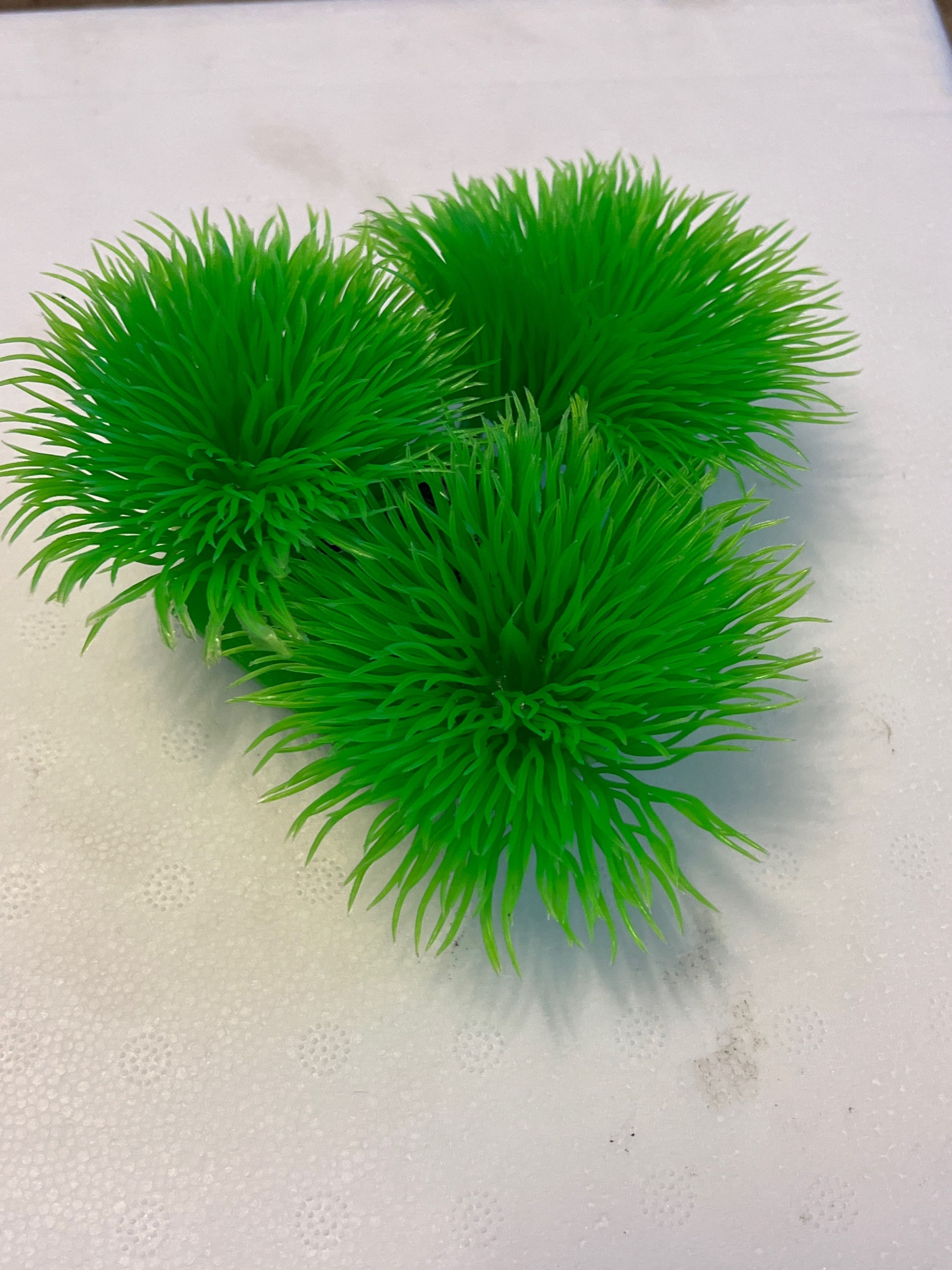 Artificial green grass plant