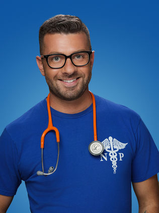 Photo of a male nurse wearing a blue shirt and a stethoscope around his neck.