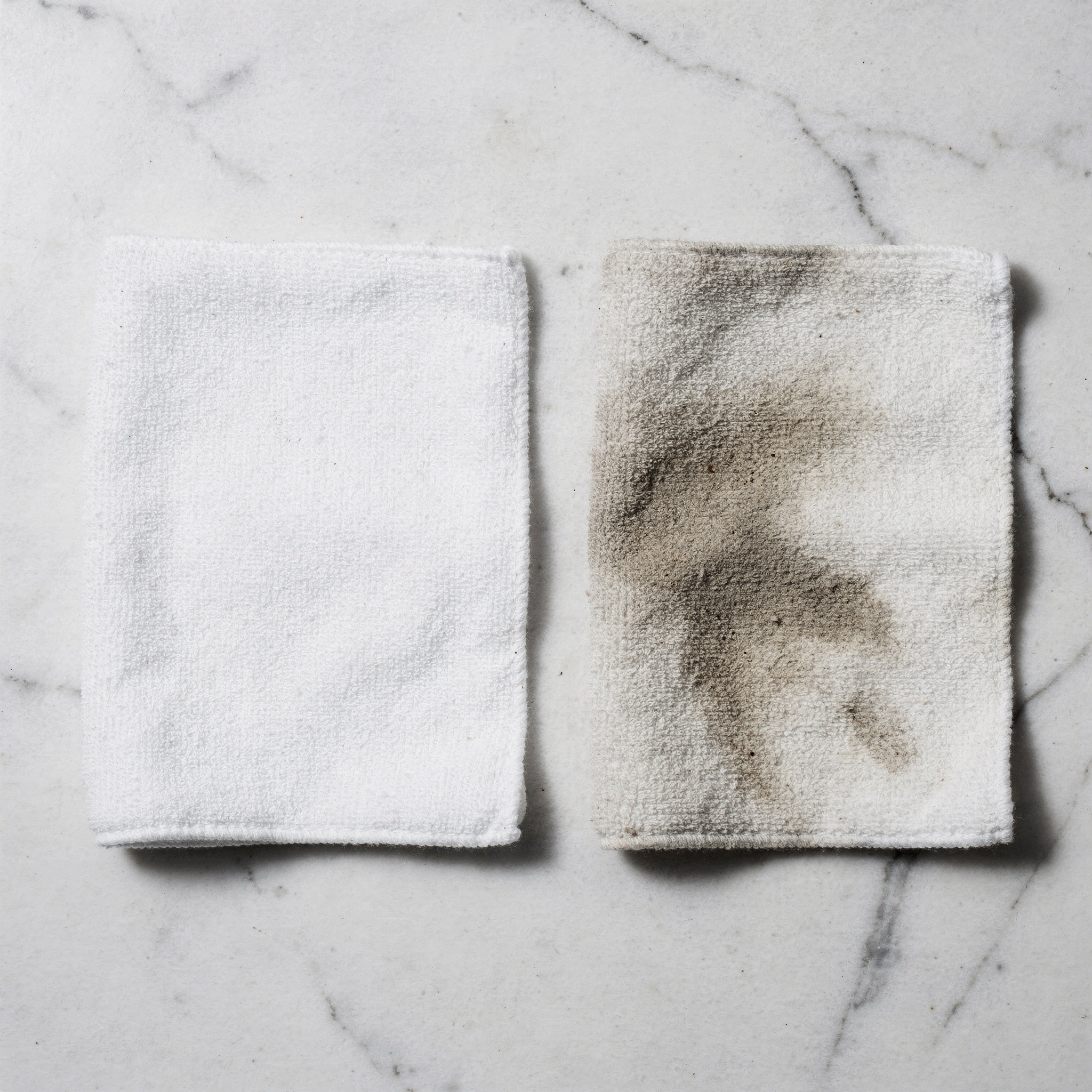 Cloth showing grey mould residue lifted from the leather surface