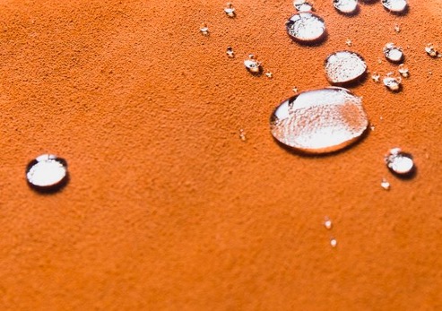 Water drop test on a hidden area of leather