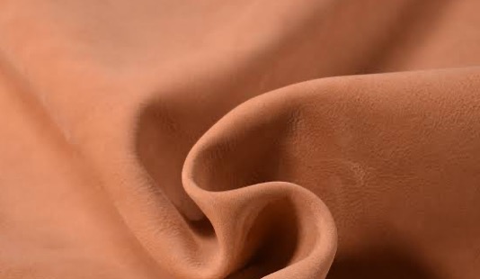 Caring for uncoated leather with a soft cloth