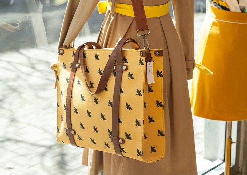 Leather bag stored in a breathable dust bag