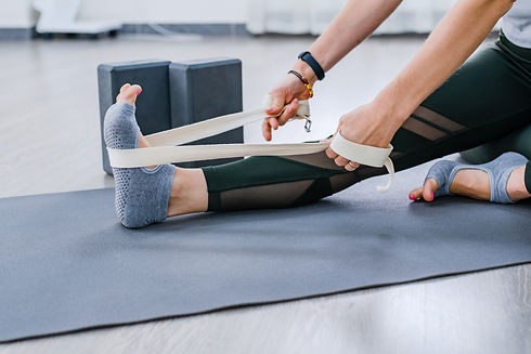 cropped-fitness-young-woman-doing-yoga-exercise-le-2021-12-28-21-51-08-utc.jpg