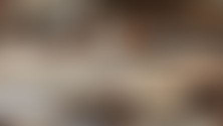 A collection of woodworking tools and projects on a table.