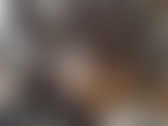 A table showcasing mandala and laser-cut art.