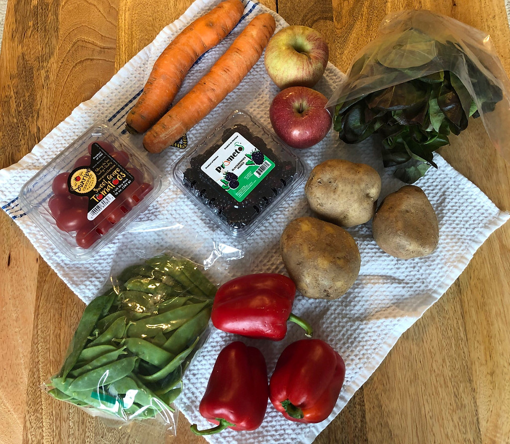 Peppers, potatoes, carrots , greens and other rescued produce in my Hungry Harvest box