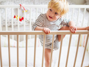 When to Move From a Cot to a Bed?