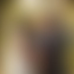 Bride and groom exchange vows under a floral arch, smiling at each other. Sunset light, pink roses, outdoor setting, romantic atmosphere.