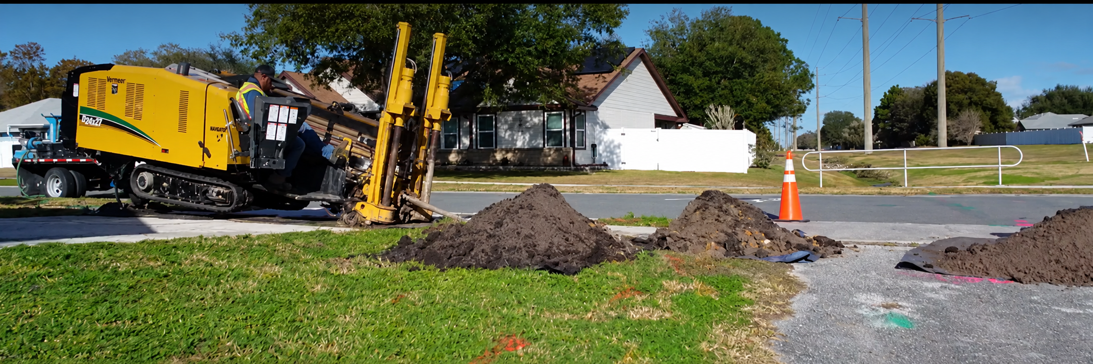DUS directional drill operating at a roadside utility installation