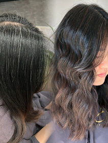 Before and after photo of a gray blending salon service, showing a seamless transition from natural roots to soft, blended gray highlights with a stylish, wavy finish.