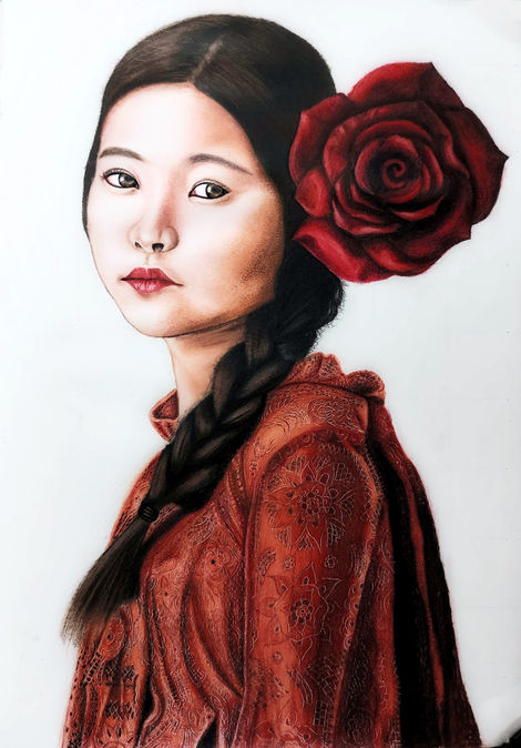 Colored pencil portrait of a young woman in a detailed red patterned garment, with a large red rose beside her head, facing s