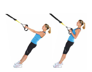 fit woman performing an inverted row with suspension straps