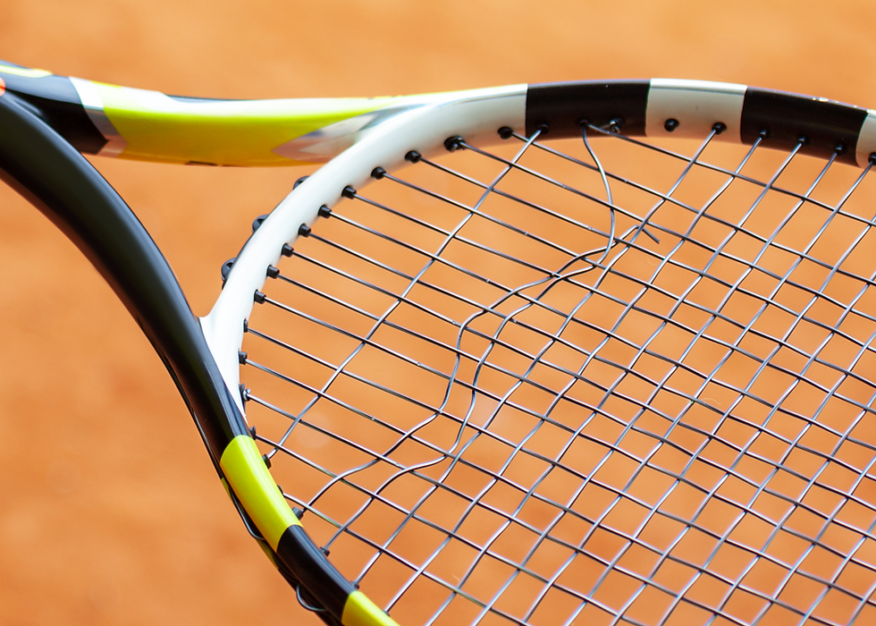 Babolat racquet with a broken string